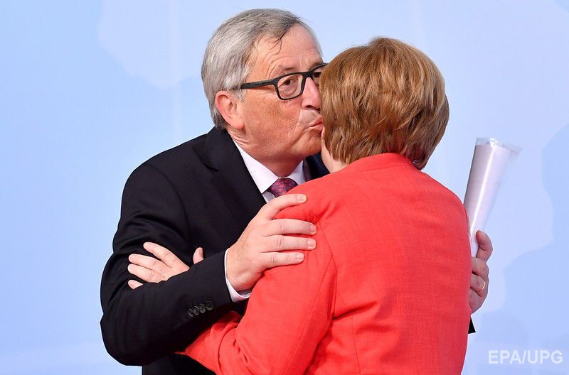 Президент Европейской комиссии Жан-Клод Юнкер и канцлер Германии Ангела Меркель