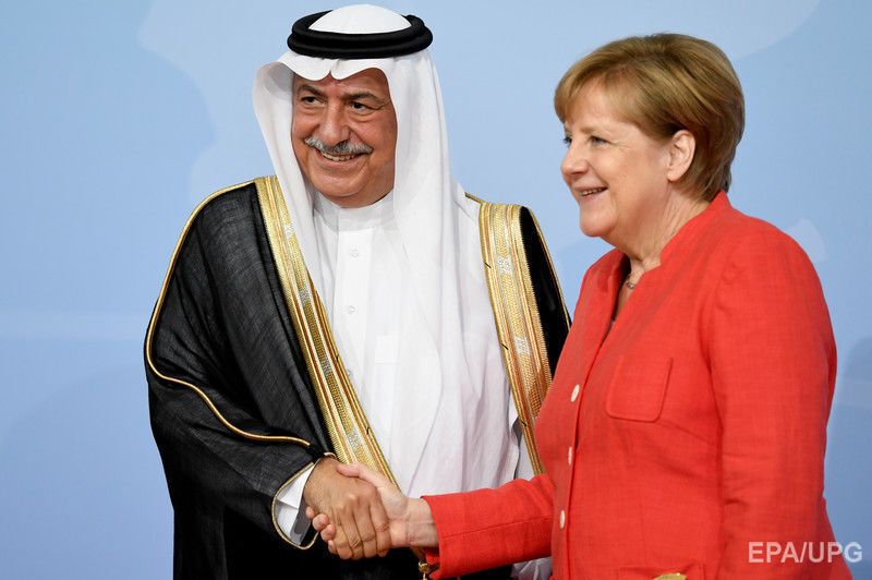 Член правительства Саудовской Аравии, бывший министр финансов Ибрагим аль-Ассаф и канцлер Германии Ангела Меркель