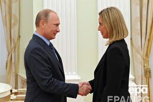 Президент РФ Владимир Путин и высокий представитель по вопросам расширения и политики безопасности ЕС Федерика Могерини