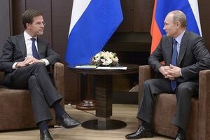 Марк Рютте и Владимир Путин во время встречи в Сочи 7 февраля 2014 года