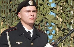 Евгений Пушкарев в почетном карауле во время празднования Дня солидарности. По словам его мамы, война для него была игрой