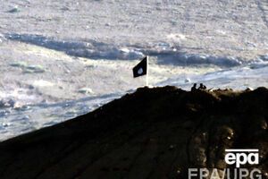 Боевики вошли в город и вывесили черные флаги