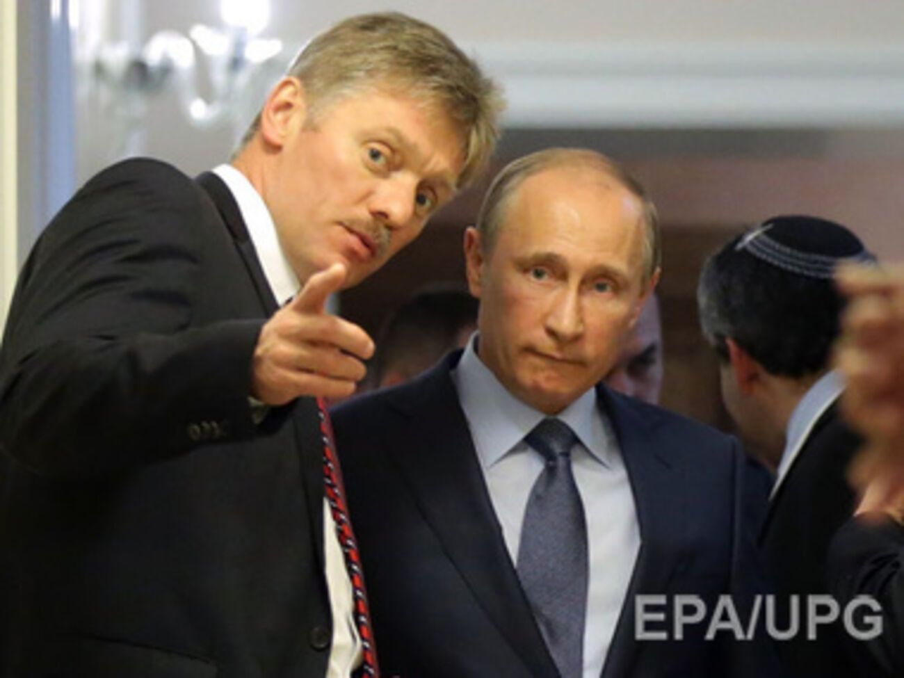 Dmitry Peskov and Vladimir Putin