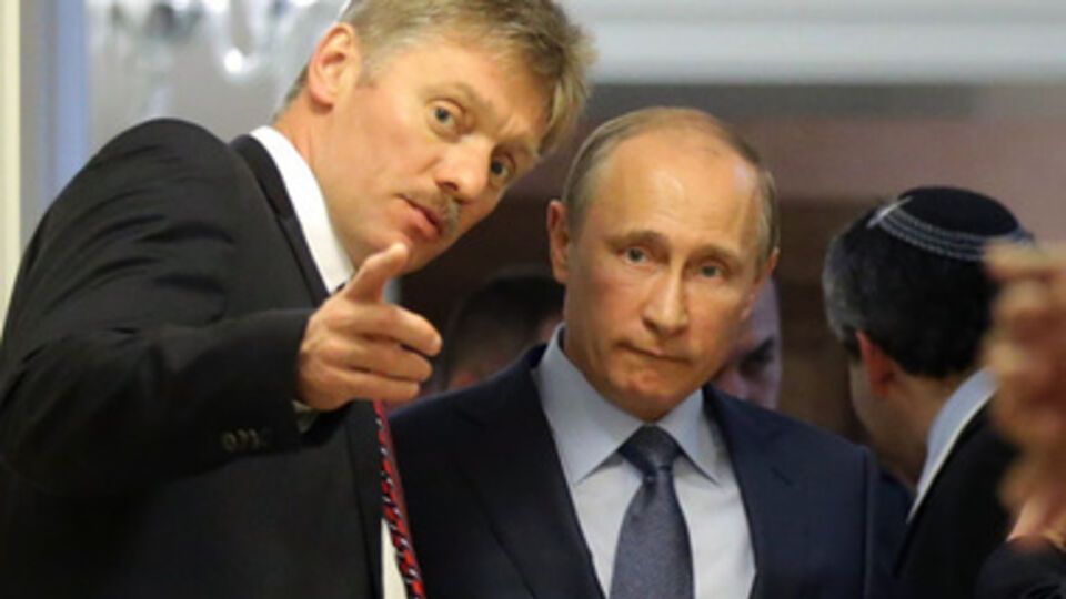 Dmitry Peskov and Vladimir Putin