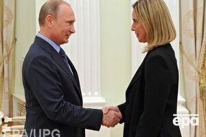 Путин и Могерини на встрече в Москве в июле 2014 года