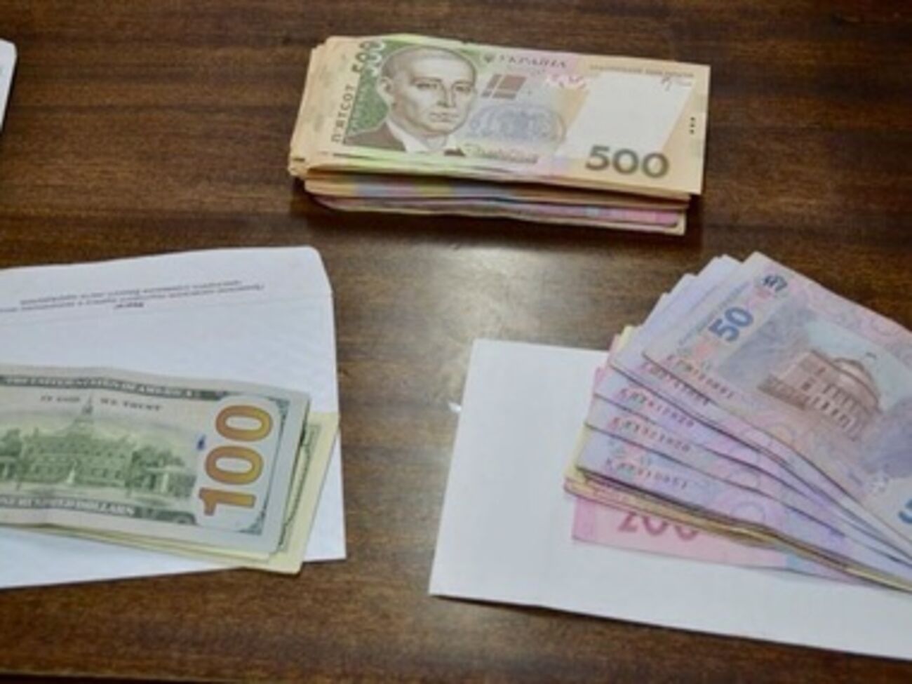 В ходе обысков в военкомате изъяли около 40 тысяч гривен и 400 долларов