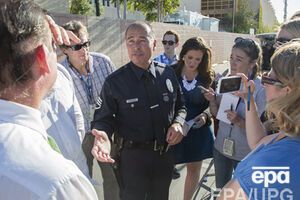 Протесты в США вызвало решение присяжных не выдвигать обвинений против офицера полиции