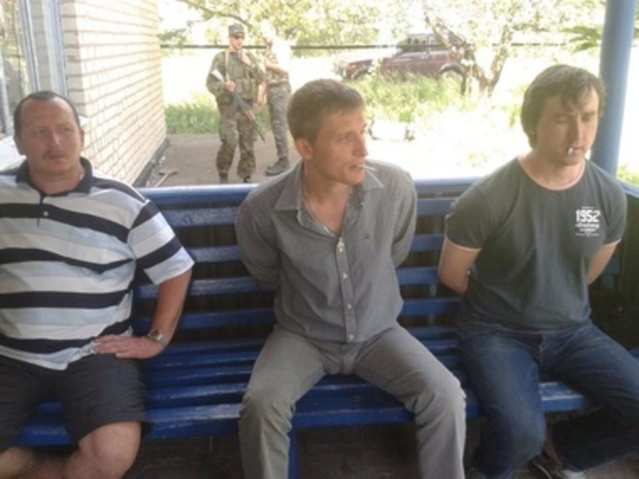 В задержанных российский телеканал узнал журналистов Олега Сидякина и Марата Сайченко