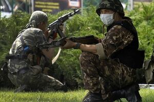 Террористы пытаются забрать трупы с поля боя
