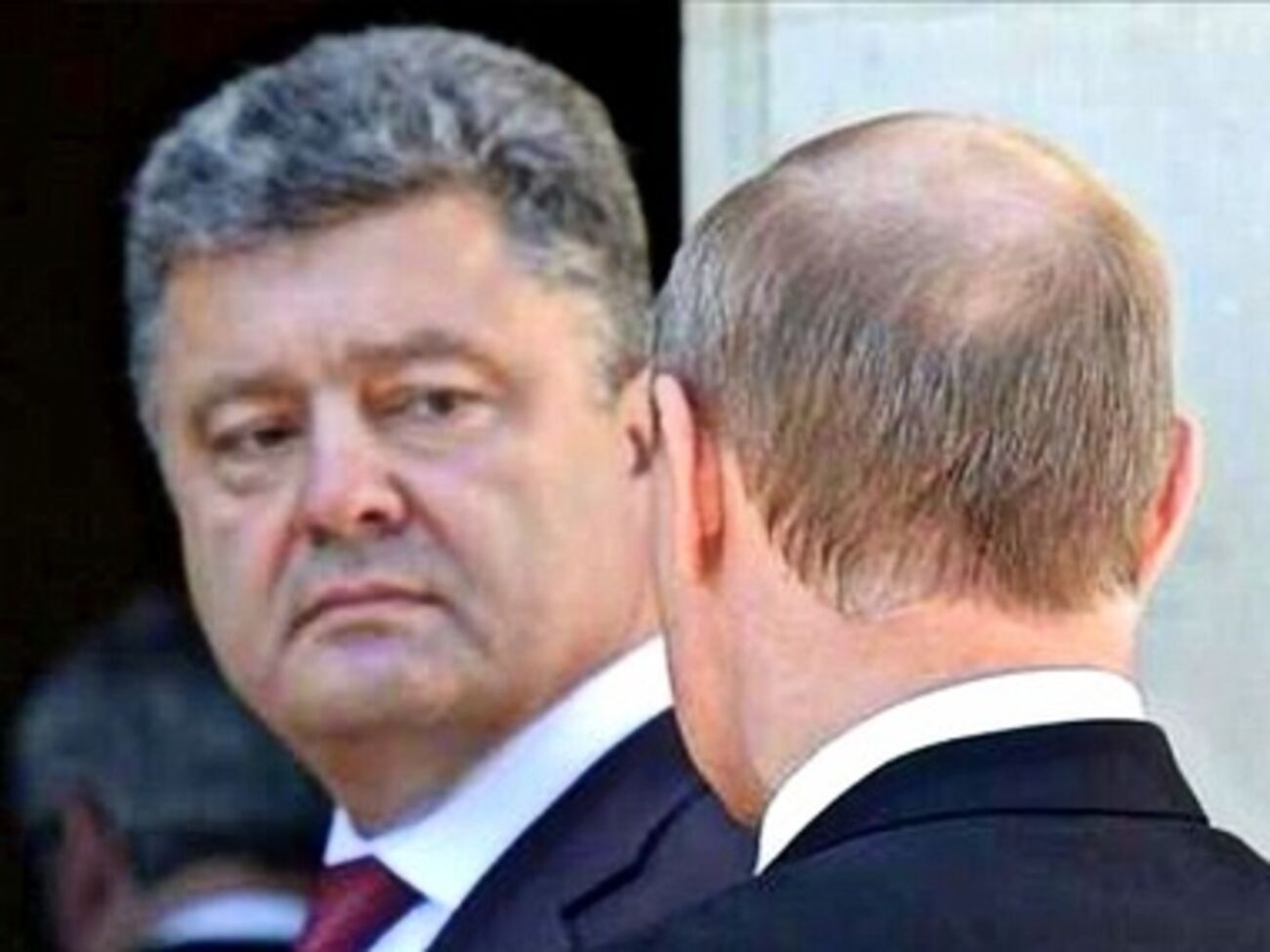У Порошенко сообщили, о чем он говорил с Путиным