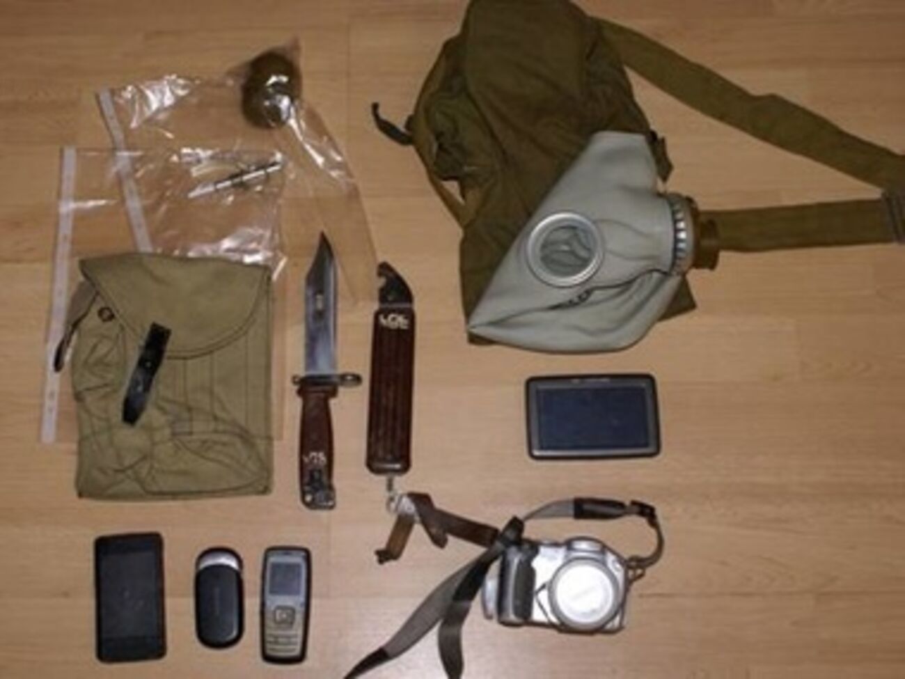 При задержании были изъяты граната, штык-нож, карты местности и паспорт с московской пропиской
