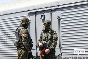 Вооруженные сепаратисты охраняют вагоны с телами жертв катастрофы