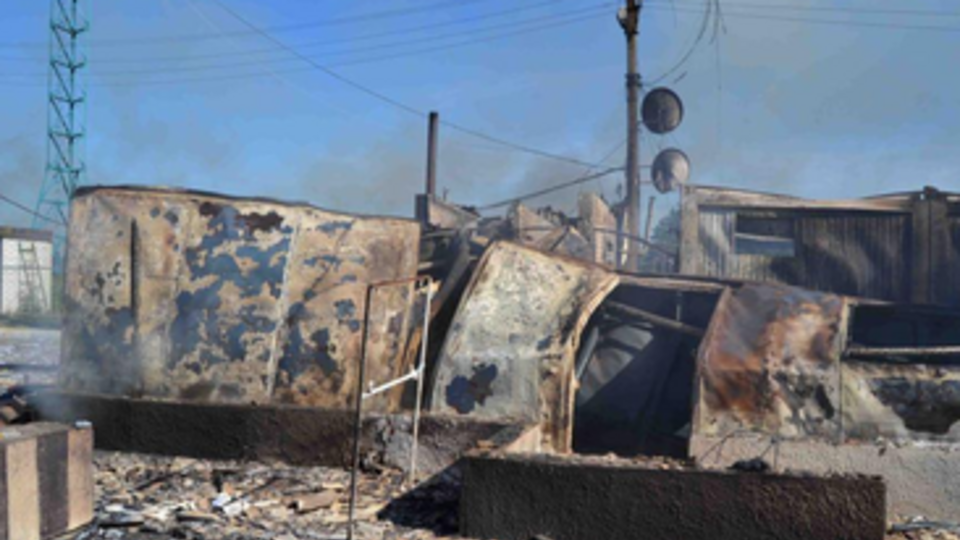 Пункт пропуска "Красная Таловка" в Луганской области после обстрела боевиков. Фоторепортаж