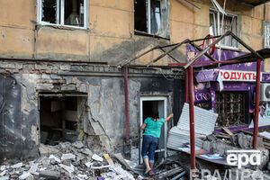 Меркель помнит Донецк целым, фото разрушенных домов ее поразили