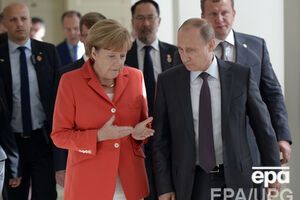 Путин и Меркель условились продолжить диалог по украинской проблематике на различных уровнях