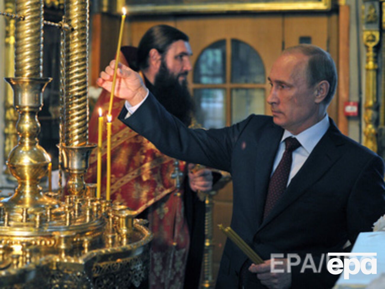 Владимир Путин: Я поставил свечи за тех, кто пострадал, защищая людей в Новороссии