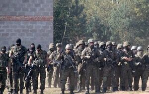 В ходе учений Rapid Trident-2014 военнослужащие отрабатывают задачи миротворческого характера