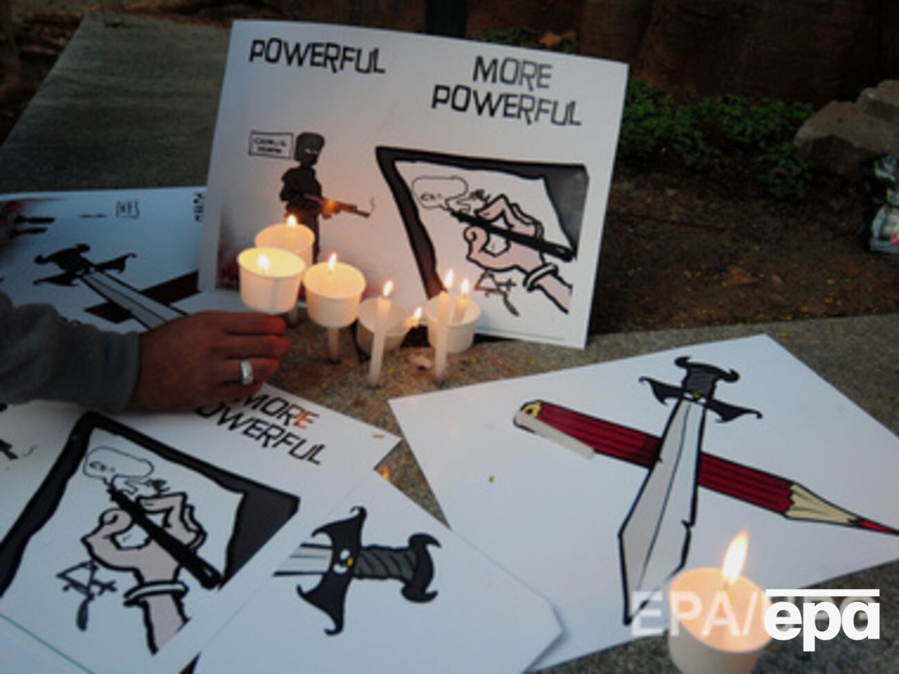 Террористы расстреляли редакцию издания за карикатуры