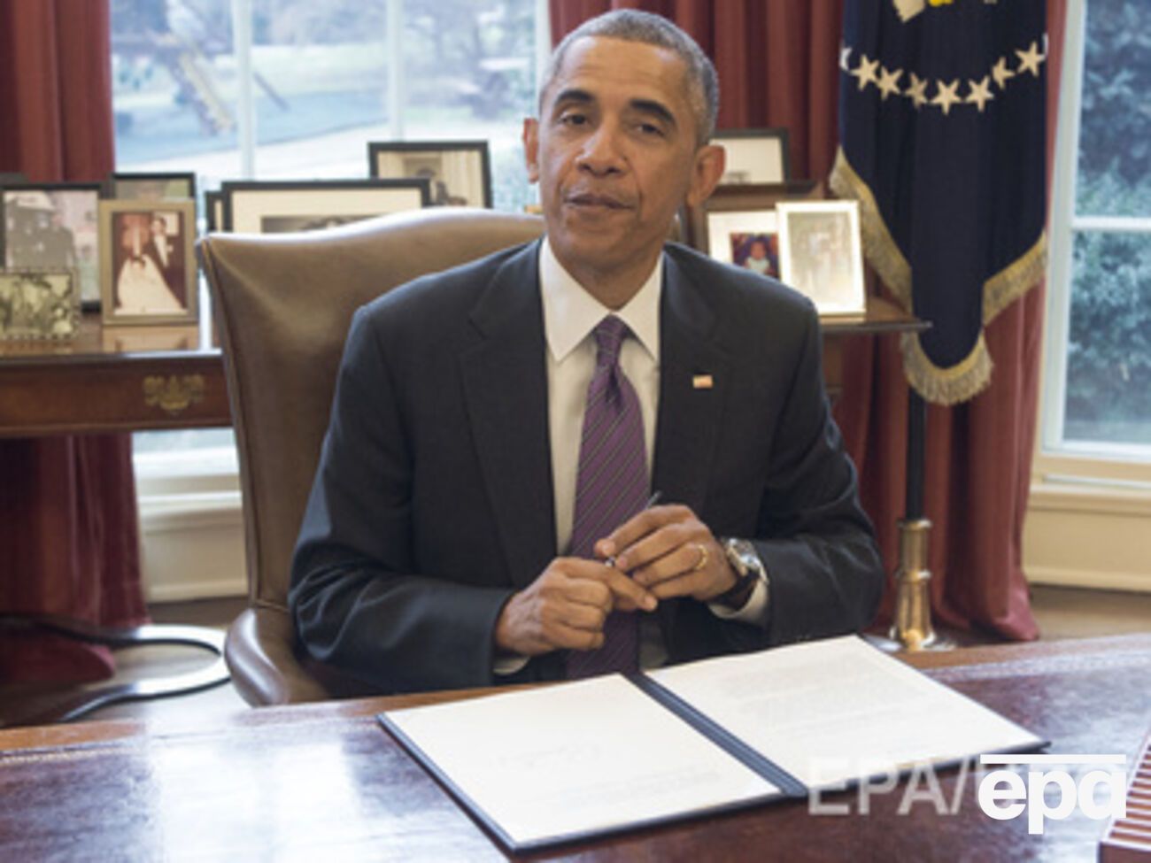 Обама и Меркель выступают за финансовую помощь Украине