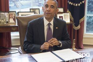 Обама и Меркель выступают за финансовую помощь Украине