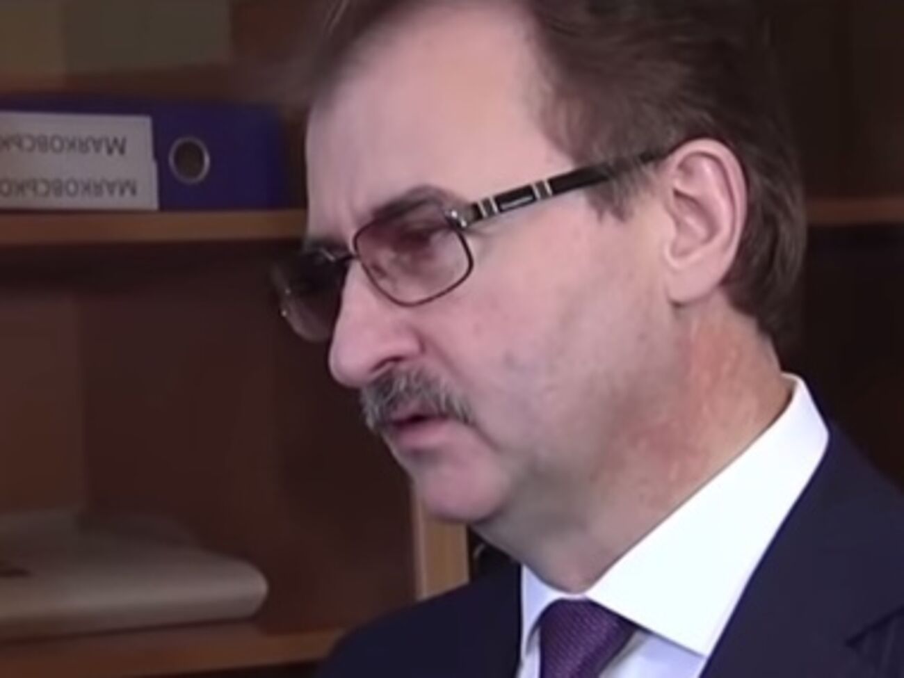 Александра Попова обвиняют по нескольким статьям Уголовного кодекса Украины