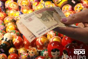 Рубль укрепился к доллару и евро