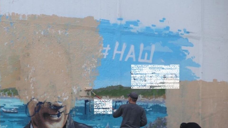 Испорченные граффити закрасили