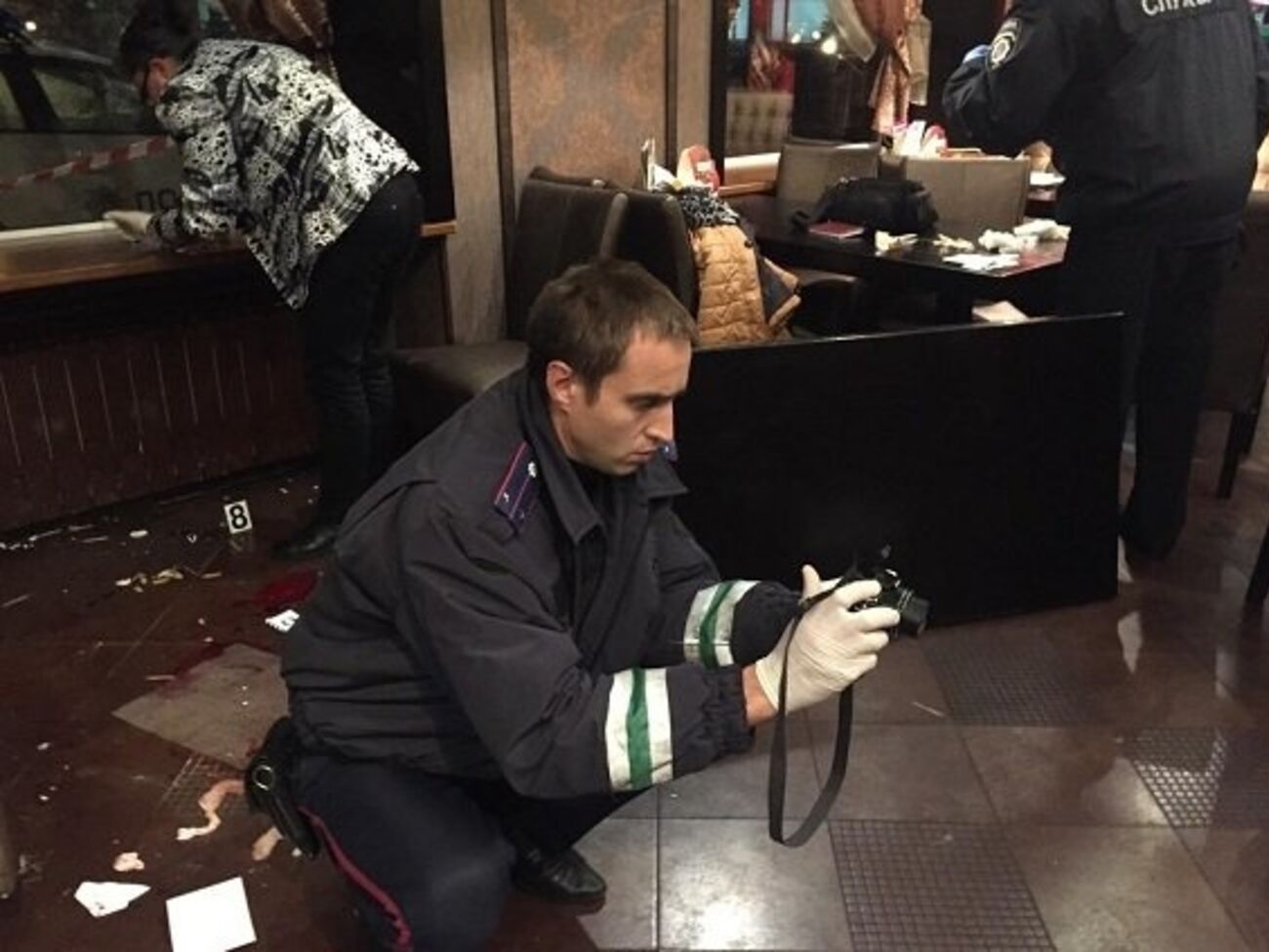 Милицейские эксперты работают на месте происшествия