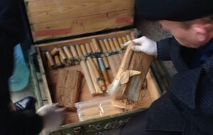 В гараже военного нашли склад боеприпасов