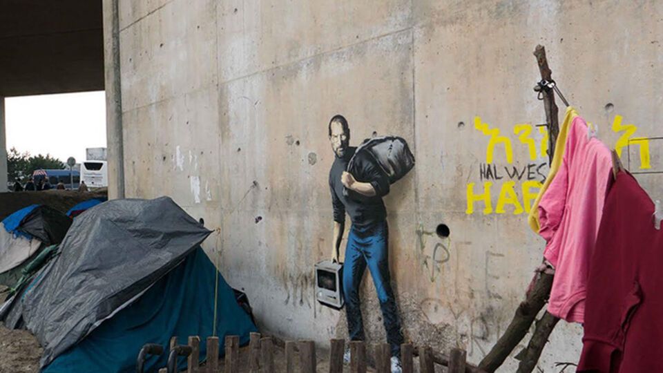 Во Франции появилось граффити с сыном мигранта из Сирии Стивом Джобсом