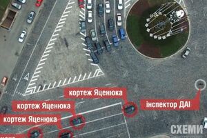 Инспектор ГАИ перекрывает движение для проезда Яценюка