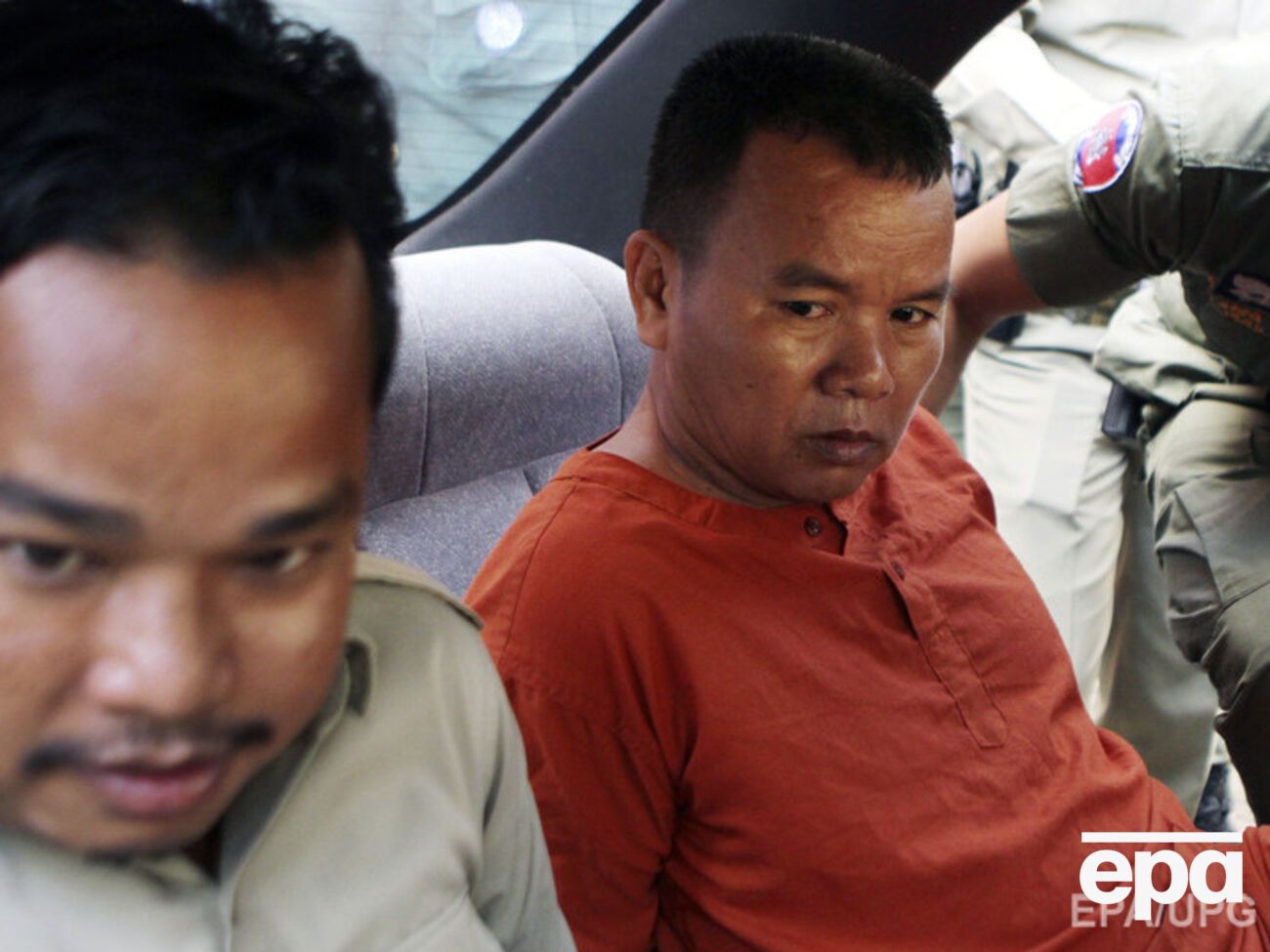 Врача Йема Чрина (справа) приговорили к 25 годам тюрьмы