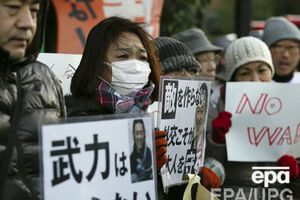 Манифестация против терроризма в память о журналисте Кендзи Гото