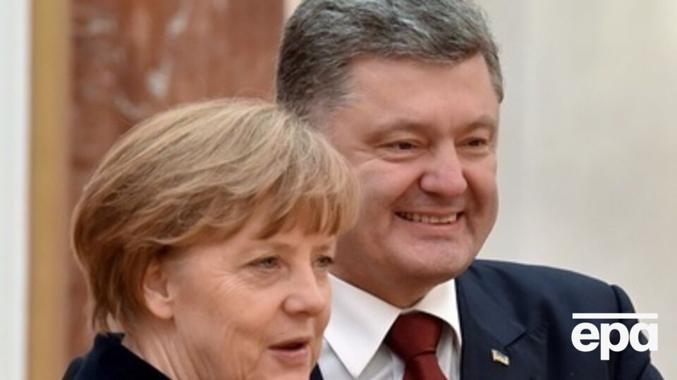 Порошенко и Меркель во время переговоров в Минске