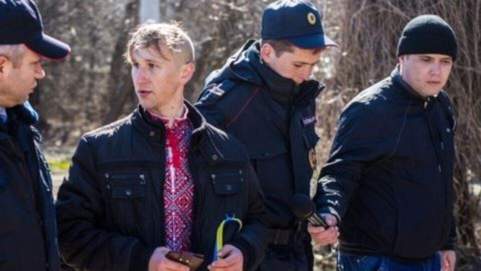 Один из задержанных на митинге активистов