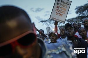 В Нигерии тысячи человек вышли на демонстрации в годовщину похищения исламистами 200 школьниц. Фоторепортаж