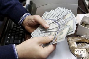Укрепление гривны остановил Нацбанк, который вышел с покупкой по 21,5 грн/$1