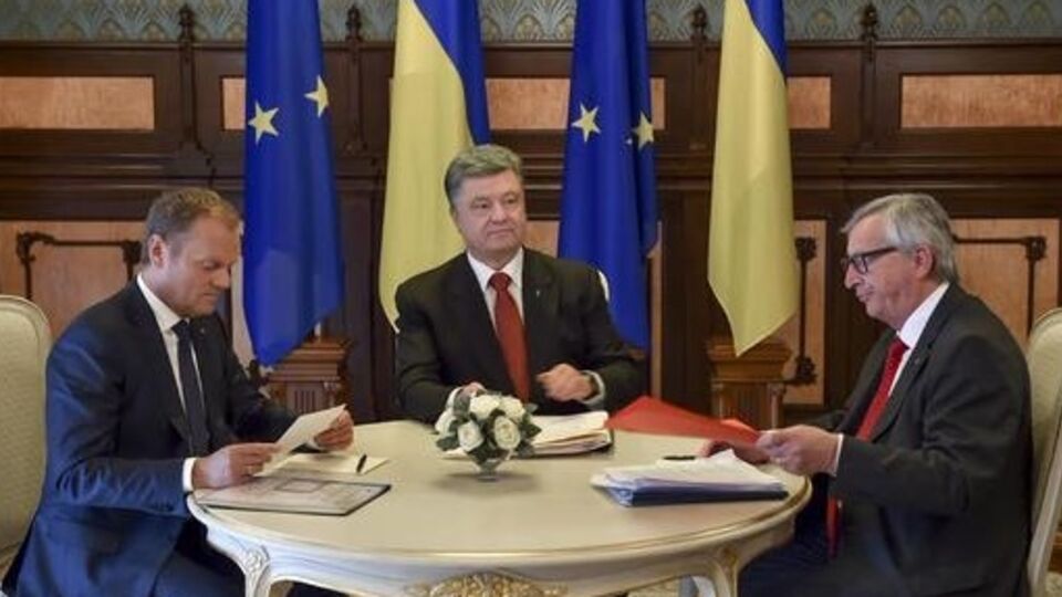 Дональд Туск, Петр Порошенко и Жан-Клод Юнкер во время встречи в Киеве