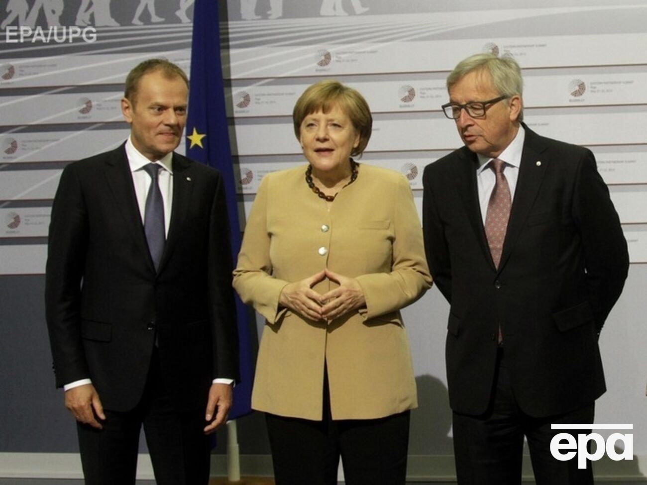 Участники саммита &ndash; президент Евросовета Дональд Туск, канцлер Германии Ангела Меркель и президент Еврокомиссии Жан-Клод Юнкер