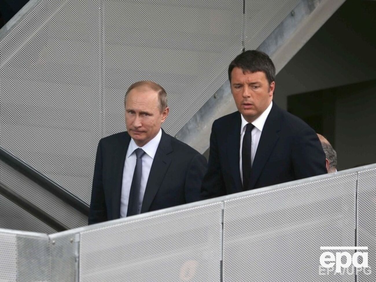 Президент РФ Владимир Путин и премьер-министр Италии Маттео Ренци во время встречи в Милане