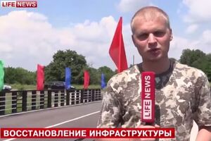 Репортер LifeNews Сергей Давыденко.