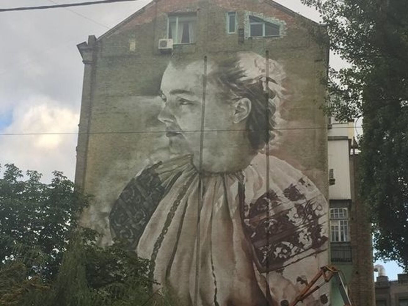 Автор граффити --- австралийский художник&nbsp;Гвидо Ван Хелтен