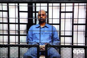 Сын Каддафи приговорен к расстрелу