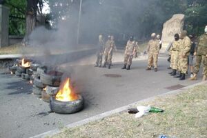 В Киеве участники марша добровольческих батальонов требуют признать АТО войной. Фоторепортаж
