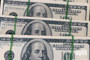 Нацбанк понизил курс гривны к доллару и евро