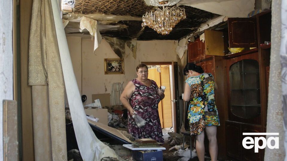 Последствия попадания снарядов в жилые кварталы Донецка