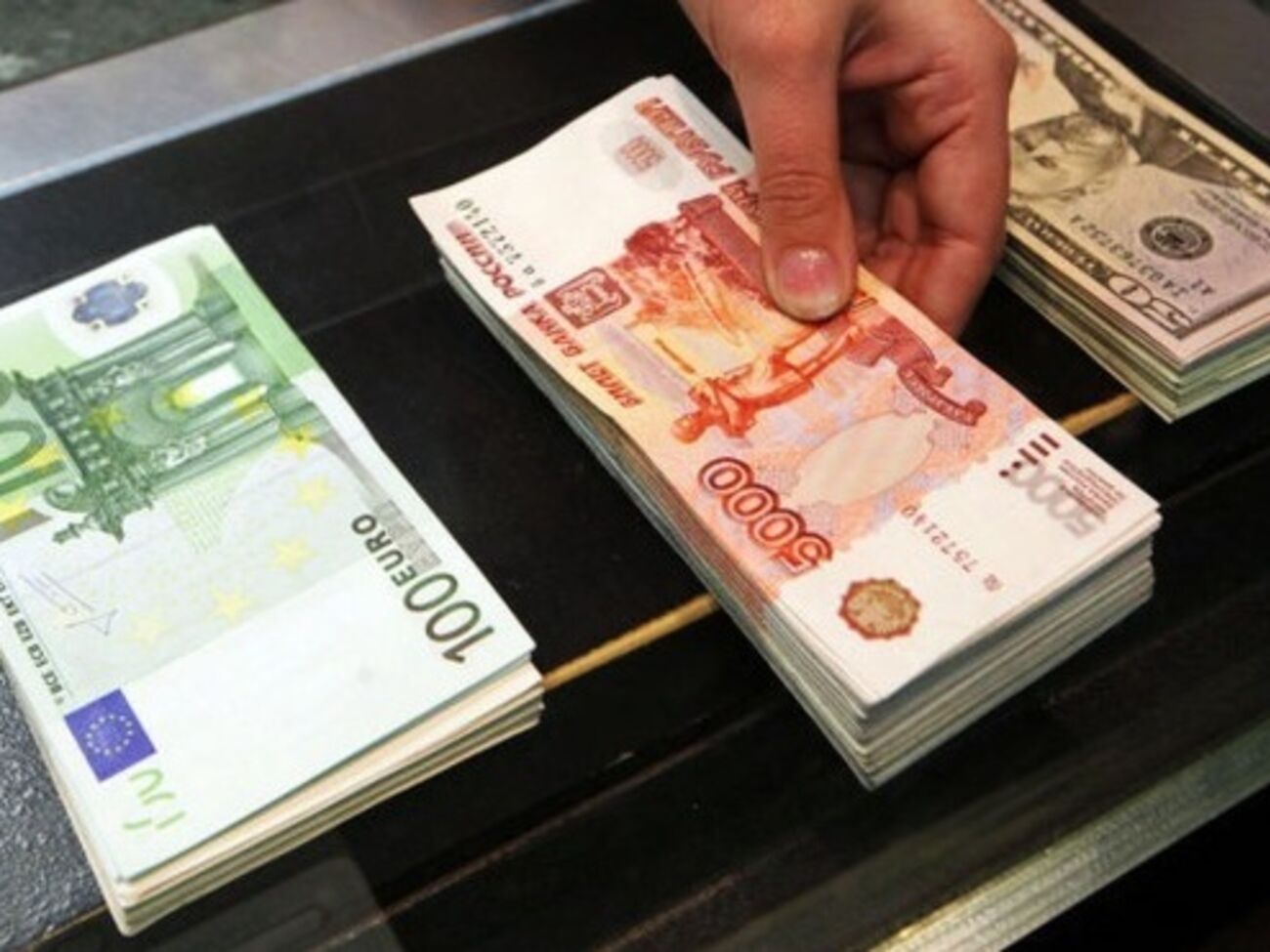 Курс доллара на Московской бирже вырос почти на 0,5 руб. за время выступления Путина в ООН