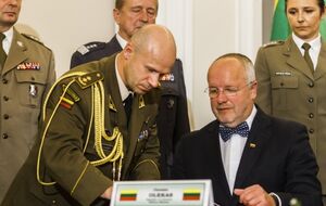 Церемония подписания договора о создании бригады в 2014 году в Варшаве