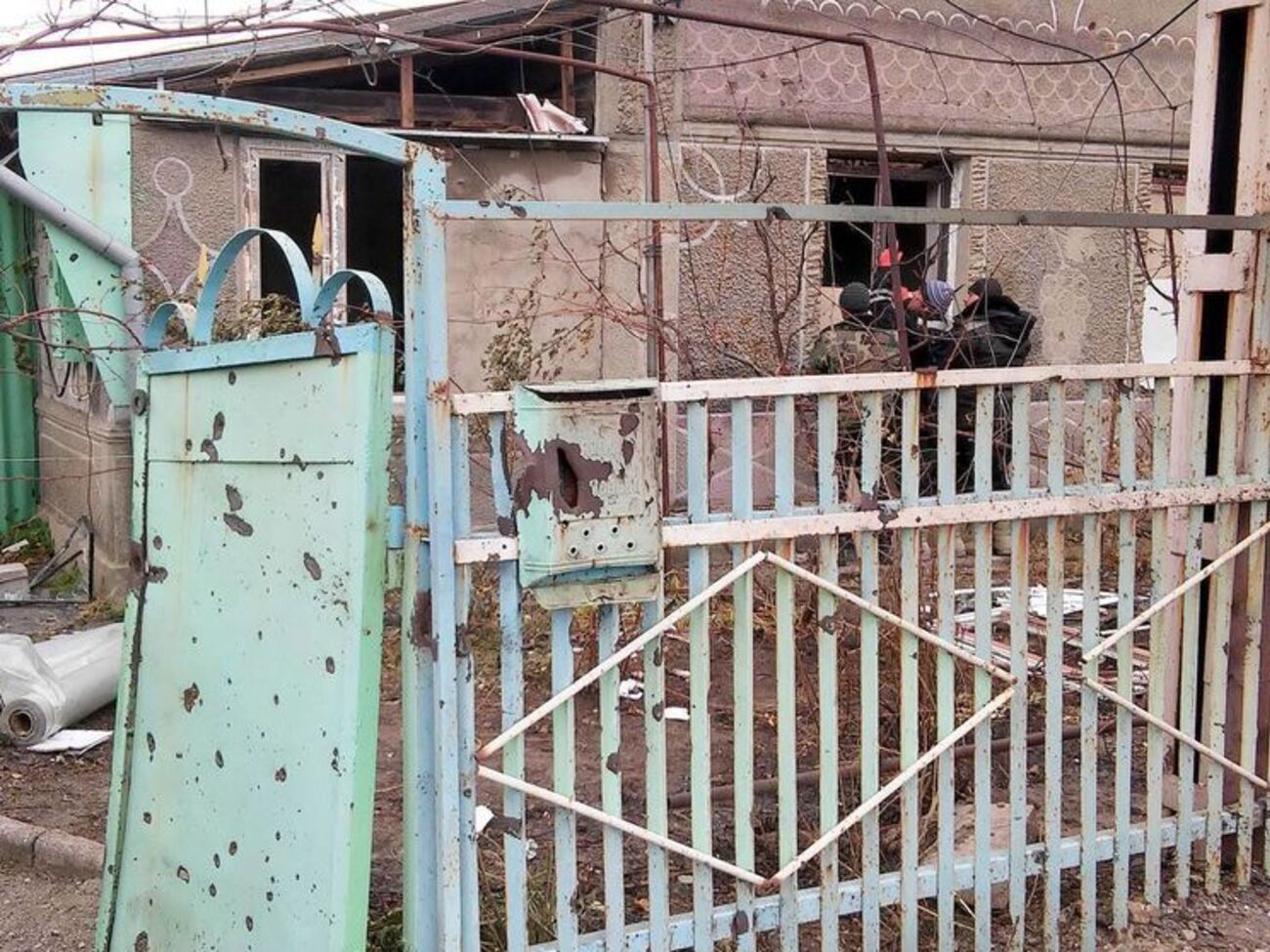 Последствия обстрела боевиками "ДНР" Талаковки