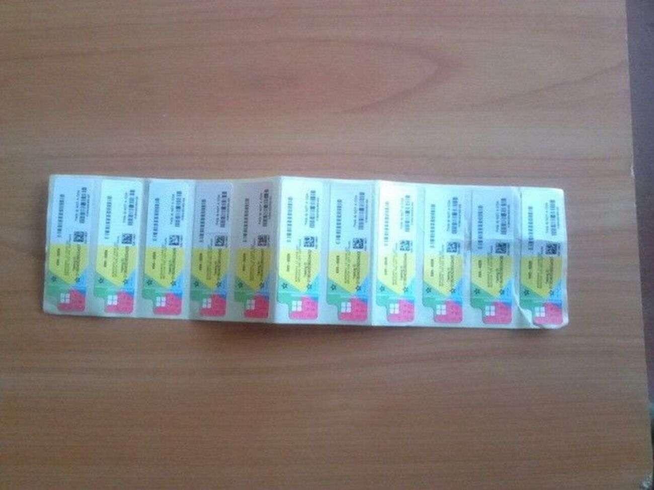 СБУ: Для "маскировки" сделки чиновники наклеили на служебные компьютеры "стикеры" реального производителя программного обеспечения